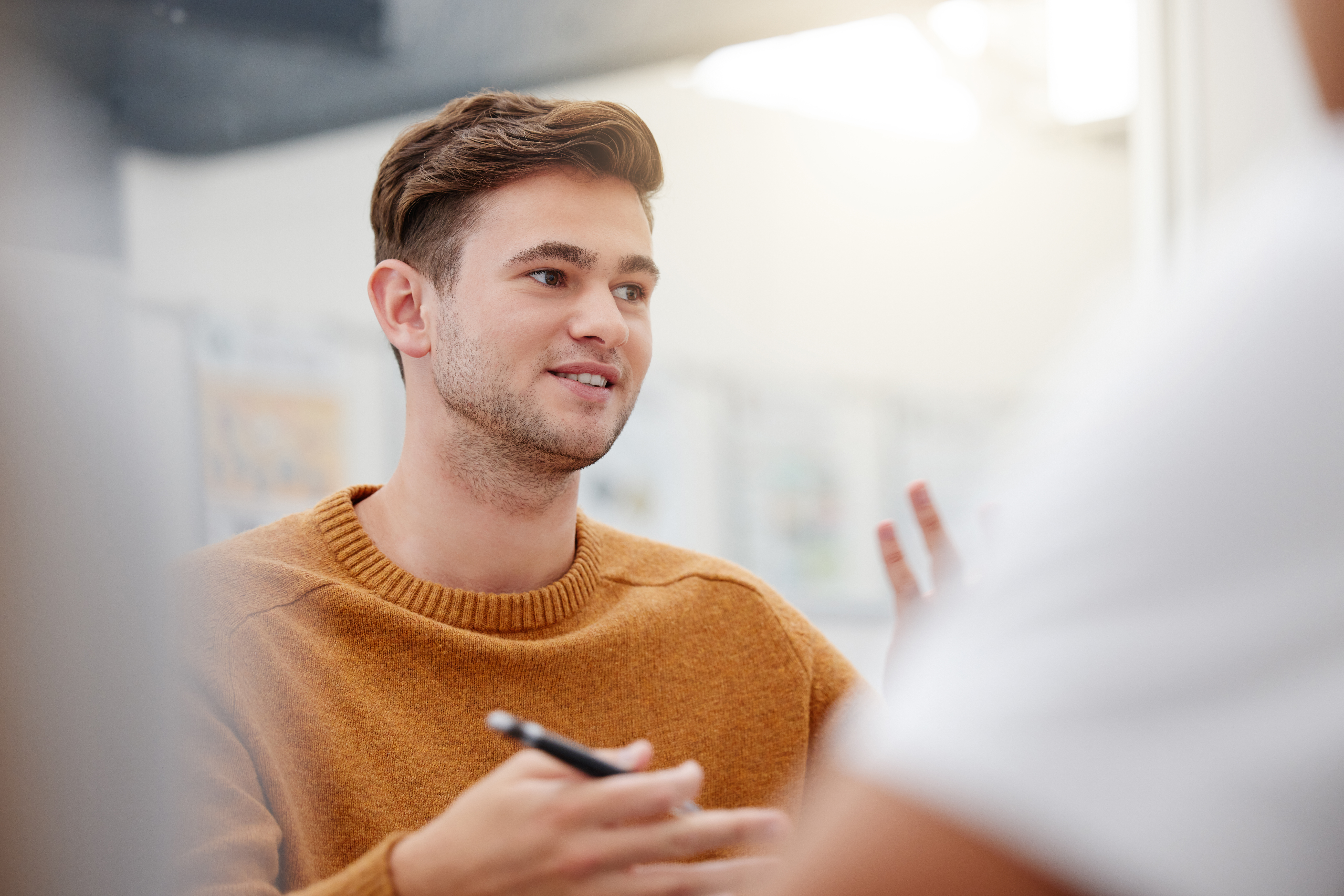 image of a man explaining something